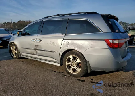 2012 Honda Odyssey Touring z USA, uszkodzony, nr VIN 5FNRL5H95CB088273